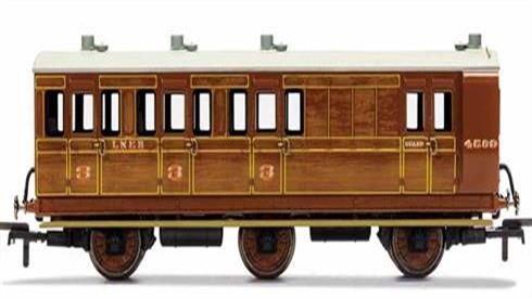 OO gaughe models of passenger coaches and goods wagons owned by the LNER and constituent companies.