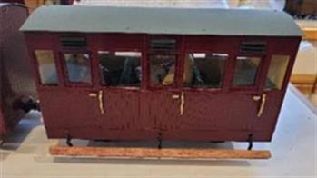 A selection of 16mm coaches and wagons