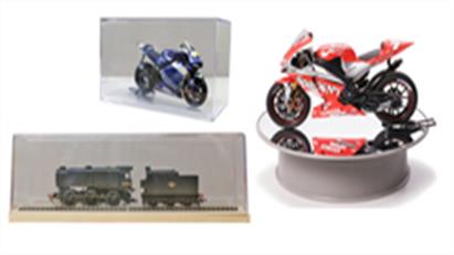 Plastic display cases and covers to display models and keep the dust at bay.