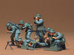 7 figure set of German machine gun troops in a variety of poses including weapons and equipment.Glue and paints are required