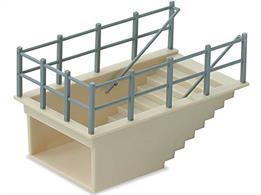 Subway Staircase kit. Designed to fit into a platform top without the need to cut a hole in the baseboard. The kit contains parts to build two subway staircase units which can be modified to form one greater depth if required. Although designed primarily for use on stations, the 20th century townscape provides many other oppertunities for use such as, an u7nderpass, public convieniences, road junction or tourist attraction. L:60mm D:20mm W:34mm.