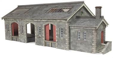 Pre-printed card construction kit building a model of a large stone-built Midland Railway goods shed, as constructed along the Settle to Carlisle line.Designed footprint 268mm x 132mm plus office building 65mm x 56mm (excluding entry steps)