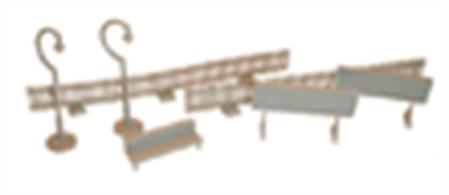 A pack of unpainted station platform accessories including fencing, seating benches, non-working lamps and notice boards.
