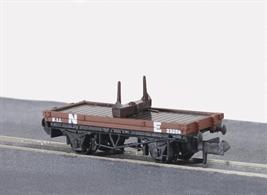 A pair of timber bolster wagons in the LNER bauxite livery, with the abbreviated NE lettering.