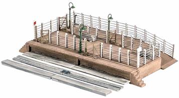 A common feature of country stations large and small, whilst market town cattle docks could be very large indeed. Our model is of the one at Yeovil Pen Mill (GWR) Station, Somerset. Livestock (Modelscene Cows Ref. 5100, Sheep and Lambs Ref. 5110, Pigs Ref. 5108, and Horses Ref.5105) was conveyed on British railways until around 1973, although many cattle docks remained in place unused, becoming overgrown - an interesting scenic feature. Supplied with pre-coloured parts although painting and/or weathering can add realism; glue is required to complete this model. Footprint 170mm x 110mm
