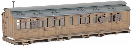 If you have a large goods yard on your layout, this would make a good mess coach for the staff. It could also be used as a dwelling or provide sleeping accomodation on a campsite. Includes clutter; glue and paints required to complete model. Footprint: 195mm x 45mm