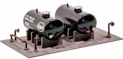 A very useful set of oil storage tanks. Designed for use with oil depot kit 529, these have many other uses like fuel storage for diesel locomotive depots.