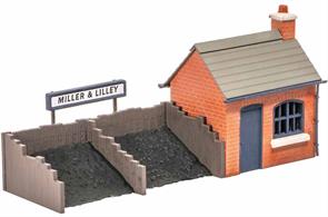 In the days when everything came by rail, even the smallest goods yard would provide a facility for the local coal merchant next to a siding. The Ratio 526 Coal Sacks kit and Peco Scene Real Coal Refs PS-330,1 and 2 can provide extra detailing, as can the Modelscene Coalman and Scales Ref. 5029. Supplied with pre-coloured parts although painting and/or weathering can add realism; glue is required to complete this model. Footprint 140mm x 30mm