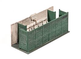 This type of urinal, consisting of cast iron screens but otherwise open to the elements was found at busy locations in city centres and railway stations. Supplied with pre-coloured parts although painting and/or weathering can add realism; glue is required to complete this model. Footprint: 92mm x 34mm.