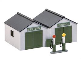 A 1930's style garage and petrol station. Pumps included. Supplied with pre-coloured parts although painting and/or weathering can add realism; glue is required to complete this model. Footprint: 114mm x 84mm.