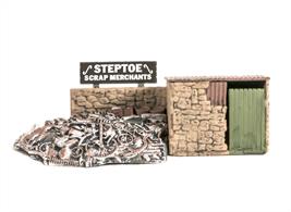 This scrapyard kit includes a stone shack and some ready made scrap.Supplied with pre-coloured parts although painting and/or weathering can add realism; glue is required to complete this model. Footprint: 98mm x 46mm