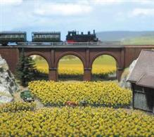 A kit providing 96 sunflowers sized for N gauge model railways. Self-coloured plastic mouldings are used to quickly assemble an entire field of sunflowers.Designed for N scale model railway scenes, but useful for dioramas and architectural models in the 1/100 to 1/200 scale range.
