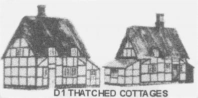 Card model kit to construct atypical country thatched cottages.