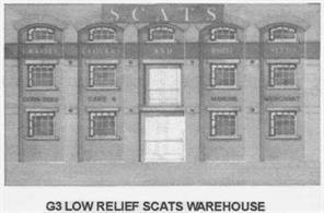 Low relief models allow the frontage of a building to be placed against a backdrop to provide a natural edge to scenes.The SCATS (Southern Counties Agricultural Trading Society) warehouse card kit allows you to place a siding close along the backdrop of your railway to serve this business without using up space with a full depth of a building.