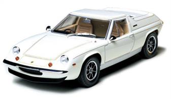 This is the 1/24 scale model assembly kit based on the Lotus Europa Special, released in 1972. Its sharp design and low body have been authentically captured in 1/24 scale. With the removal of the hood, the engine can be viewed even after completion. The Y-shaped backbone frame is molded together with rear radius arms as one-piece. The front double wishbone suspension, stabilizer, rear upright, and engine are all assembled to this frame. Constructed just like the real car, the floor part is directly attached to the built up frame, and the body is mounted on top. The engine features the realistic recreation of the cam cover, unique to the "big valve" system, as well as a twin carburetor, 5-speed transmission, and shift linkage in the rear. The tight cockpit sports a 6-meter instrument panel set in one neat row, high backed seats, 3-spoke steering wheel, and short knob gear shift. Starting with the Lotus logo at the end of the hood, all the emblems, key holes and mirror faces have been richly recreated as metal transfers. The body pinstripes have also been included as decals.Glue and paints are required 