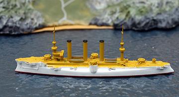 A 1/1250 scale metal model of Brooklyn, in the full white and buff of the US New Navy.