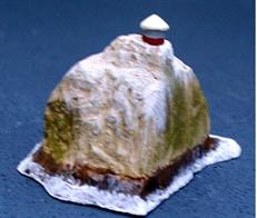 A 1/1250 scale model of Rockall with waves breaking at the base, the westernmost part of the British Isles was fitted with a lighthouse in 1972.