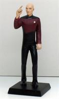 Nice figure of Jean-Luc Picard, stands approximately 4" (100mm), on it's own base.