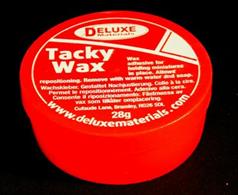 Wax adhesive for holding miniatures in places. Allows repositioning