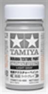 Tamiya Pavement Light Grey Textured Paint 87116A water-based paint has a paste-like composition with ceramic particles to create bumpy surfaces.