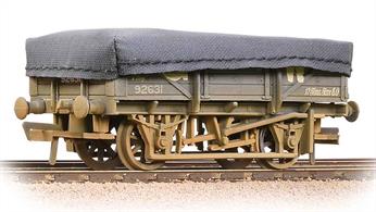 Model of a 5 plank end door china clay wagon in GWR grey livery. These wagons were used to convey china clay from the clay dries at the quarries to the UK potteries, paper plants and ports for export. When loaded the wagons were covered by a tarpaulin to prevent contamination of the load.Cornwall was the main source for china clay so the GWR owned a fleet of these wagons, with more being built by British Railways after nationalisation, these later wagons remaining in service until the early 1980s.Era 3 1923-1948 (grouping)