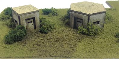 Two new "Mini Kits" are now available in both OO/HO and N scale. Each kit contains a set of two World War Two Type 22 and 26 reinforced concrete machine gun emplacements, the type still seen around the southern British countryside, and more often than not near the railway.