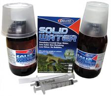 Deluxe Materials Solid Water 350ml DM103Simulates Chrystal Clear Water - special clear low odour resin. Easy to use, sets solid to simulate water in scenic or miniaturist modelling eg; aquaria, drinks, ponds.Kit contains resin, hardener, 2 syringes, mixing cup. Mixing ratio: 2 parts resin/1 part hardener. May be coloured with resinous toning dyes. Once set Solid Water is permanent.