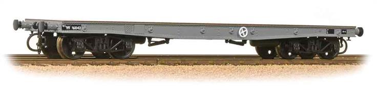A new model of the War Department Warflat bogie flat wagon designed to convey heavy military vehicles during WW2.This model is painted in British Railways wagon grey.Era 5 1957-1966