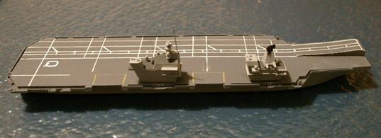 A 1/1250 scale metal waterline model of the HMS Queen Elizabeth R08, now in service with the RN. The model is fully assembled and painted, as shown in the photograph. Length 9" - 23 cm