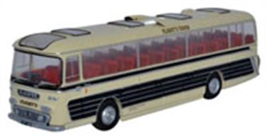 Oxford Diecast 1/76 Plaxton Panorama Flights 76PAN002Plaxton Panorama FlightsOxofrds second release of the newly tooled Plaxton Panorama 1 is a model of a coach used by Birmingham based Flight's Tours and according to its destination blind on the front, it is off to Blackpool. The body-style dates from the 1963-64 period and in its day won many awards for its streamlined appearance and comfort. Registered 977 JDB, the fresh Buttermilk cream body of our 1:76 scale model is offset with black and silver side panels and a black chassis. The contrasting interior is moulded in red with a tan dashboard. The tour company's name is printed in gold with black dropped shadow work on the sides and the front, while the back of the coach is a little more decorative with the inclusion of two fluttering pennants featuring the company name in red and gold across the boot. Silver masking adds further detail to the exterior and the company address behind the nearside front wheel arch - 114-120 Victoria Road, Aston, Birmingham, completes the effect.