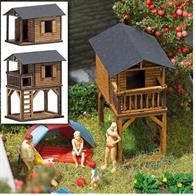 Kit for two (authentic wooden) play houses. The loft house has a finely detailed ladder and railing. The doors can be mounted in the opened position.
