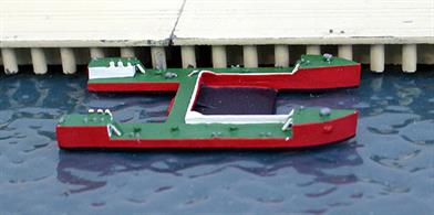 A 1/1250 scale metal model of the pollution control vessel, Westensee. This ship is designed to scoop up oil and floating debris from the sea surface and compact it toallow the pollutant to be recovered on shore. This ship is based in Bremerhaven.
