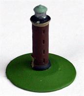 A 1/1250 scale metal model of the lighthouse at Cuxhavenon the breakwater of the harbour. The lighthouse is a brick-built tower and is still clearly visible today.