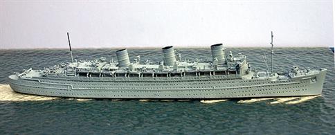 A 1/1250 scale metal model of the Queen Mary as a troopship in 1943. This model has been re-issued and shows the ship in a light grey paint finish with many AA guns and an external de-gaussing cable fitted round the hull.