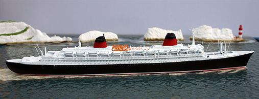 A 1/1250 scale, assembled &amp; painted, metal waterline model of France, the last great French ship of state and the largest passenger liner of her time on the transatlantic service. Transatlantic air services meant that the ship was uneconomic and she was withdrawn to be sold to Norwegian shipping interests and re-fitted to become the cruise ship "Norway".