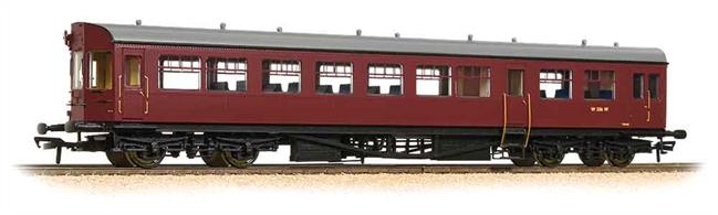 Dimensions - Length 275mm.A detailed model of the GWR style auto trailer coaches built by British Railways for use with class 14xx, 64xx and 4575 locomotives in push-pull trains.The models' detailed underframe includes suspended steps and representation of front end cab control apparatus along with a host of features such as bogies fitted with all axle phosphor bronze (low friction) bearings. The bodyshell features a detailed passenger interior and roof detail includes individually fitted GWR style shell vents. To cap off these great models, we have incorporated prototypical length buffers and buffer beam detailing accessories. Model painted in the BR lined maroon livery which was used from 1957. Era 5 1957-1966. 