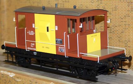 A detailed ready-to-run model of the British Railways standard 20ton goods train brake van fitted with sprung buffers and screw or instanter couplings.Model finished as van B954768 painted in BR goods brown livery with a broad yellow vertical stripe added in the centre of the van, used to identify vans fitted with guards' air brake setter valves. This van is fitted with Oleo buffers and roller bearings, carries TOPS code CAR and is also lettered both 'Air Piped' and 'To work on air braked trains only'.The CAR code indicated brake vans fitted with guards brake setter valves for both vacuum and air brake systems; these vans were frequently coupled to pilot shunters through the 1980s.