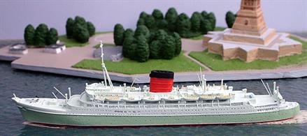 A 1/1250 scale metal model of the Cunard Line Caronia. The ship was designed for luxury cruising and was known as the green goddess.Length 175mm, Width 20mm, Height 50mm
