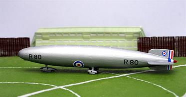 A 1/1250 scale cast resin model of HM Airship, R80. R80 and her intended sister, R81, were the last two rigid airships designed for the RNAS in WW1. They were designed by Barnes Wallis to be built by Vickers in their old airship hangar in Barrow and were shorter than other RNAS rigid airships based on German designs. The R80 was more streamlined than German practice and proved to be the best airship of the era but fell victim to Government cuts in the defence budget. R81 was never ordered.