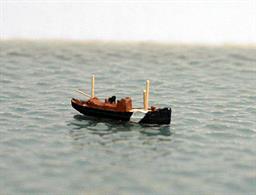 A 1/1250 scale metal model of a typical herring drifter at work and hauling in her nets.