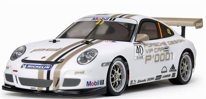 This Tamiya R/C kit faithfully recreates the Porsche 911 GT3 CUP VIP customer race car. The 911 GT3 Cup car was developed for the Porsche Super Cup, a single-make racing series gracing circuits around the world. The VIP car recreated by this assembly kit was run by Porsche themselves and was driven upon invitation by a different driver according to the race. Its powerful form and rear wing are recreated expertly in durable and lightweight polycarbonate, with separately molded side mirror parts, plus metal-plated light cases that allow the installation of separately sold LEDs front and rear. Stickers are included in the kit to recreate numerous sponsor logos and other markings.
