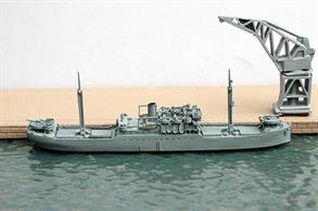 A 1/1250 scale metal model of the USS Capella used as a cargo ship for the Navy.