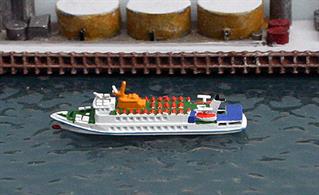 A 1/1250 scale waterline metal model of Flipper a Cuxhaven-based ferry and day trip boat handmade by Rhenania Junior RJ309.