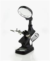 Helping hands work holder with soldering iron stand and LED illuminated magnifier glass. Battery or USB powered.2 in 1 Magnifier - dia. 75mm/3"• Main lens 3x mag.• Insert lens 4.5x mag.• 10 LEDs , giving a cool, bright lightWork holder with alligator clips &amp; mini vice.• 360 degree rotation• Locking nut adjustment• Removable mini vice with 10mm jaw capacity• Fitted with soldering iron holder &amp; soldering tray