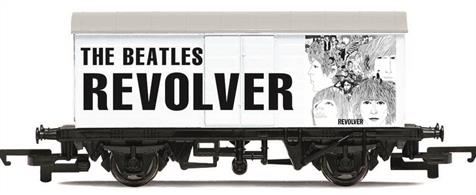 Released on the 5th of August 1966, the Beatles seventh studio album 'Revolver' was the final album produced by the group before retiring from live performances. The album contained many notable songs including 'Taxman', 'Eleanor Rigby', 'Yellow Submarine' and 'Got to Get You into My Life' which are frequently held up among the best of The Beatles' work.The album made use of many technological innovations to create a new style for The Beatles, with 'Revolver' often considered responsible for a change in the direction of Pop music. The album is celebrated by Hornby on this goods van featuring specially designed artwork inspired by the album.