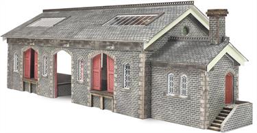 Pre-printed card construction kit building a model of a large stone-built Midland Railway goods shed, as constructed along the Settle to Carlisle line.These card kits can easily be modified to adjust the length, shape or configuration of the goods shed and office to make a smaller unit, or fit into the available space.Designed footprint 152mm x 70mm plus office building 35mm x 30mm (excluding entry steps)