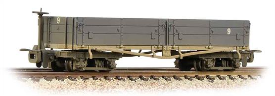 The type D bogie open wagon was one of the more versatile wagons built for the War Department Light Railways. The two-part drop sides allowed the wagons to be emptied easily when carrying aggregates, while shells, rations, ammunition, timber, fuel and water in cans and even troops could be carried easily. The Nocton Estate Light Railway was one of two large systems of narrow gauge railways in Lincolnshire using ex-WD wagons to transport the annual potato crop to local mainline railway stations. The estates principal custmer being Smiths Crisps. A considerable number of these D type bogie open wagons were operated, being ideal the rapid loading and unloading of potatos during the frenetic harvesting seasons. When not needed for the crops these open wagons could equaly easily be used to load farm supplies, animal feed and materials for the maintenance of tracks, fences, roads and gateways.