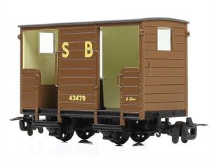 Model of a brake van, built to provide a riding van with an internal hand brake for the train brakeman while the train was moving around the depot. Finished in Stafold Barn Railway brown livery.Price and delivery to be advised.