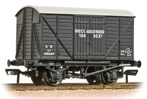 A detailed model of the GWR design shock absorbing box van painted in the GWR goods dark grey livery.Shock absorbing box vans were fitted with bodies which had some freedom of movement, controlled by springs. This helped damp out sudden shocks caused during shunting, preventing damage to the load inside the van.