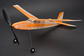 This sleek cabin style model was designed by Albert Hatfull. The ACE became a firm favourite in the Keil Kraft range thanks to the swept back wings and long thin fuselage. The construction is simple with a basic stick build fuselage and a tapered wing design. The construction lends itself to a beginner as a first built-up model but the shape also rewards experienced builders with an impressive flight performance.